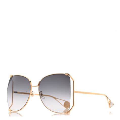 GUCCI Metal Oversized Round Sunglasses GG0252S Gold .